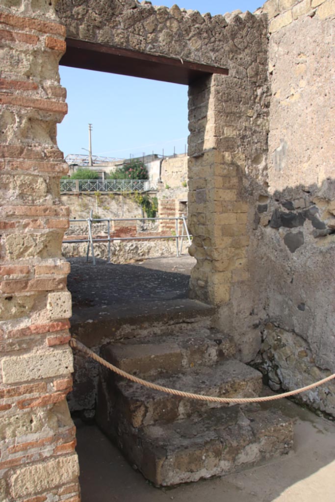 II.1 Herculaneum, October 2023.
Looking south through doorway in south-west corner of atrium. Photo courtesy of Klaus Heese.